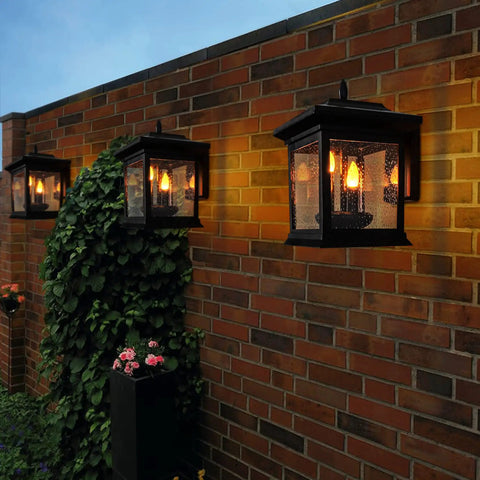 Outdoor Solar Lanterns Waterproof Hanging Lights for Garden Patio Lawn Pathway and Wall Flickering Ambience Durable IP65 Weatherproof No Wires Ideal Gift for Women and Home Decor Enthusiasts mounted on brick wall.