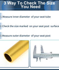 Universal 27.2x350mm Bike Seat Post In Gold Tone Aluminum Alloy, image shows measuring seat post diameter with caliper