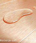 Close-up of water droplets on Copper Aluminum Peel And Stick Backsplash Tiles 3x6 Inches Brushed Copper Finish 80 Pack Self Adhesive