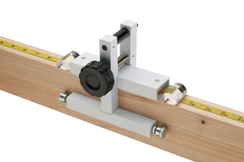 Broset Precision Stop Block W1109 attached to wooden fence for crosscuts on miter saws with magnified hairline cursor.