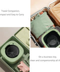 Ridiculously Compact Ten Liter Foldable Mini Washing Machine Featuring Three Auto Wash Cycles Ultrasonic Deep Cleaning And Blue Light Sterilization Makes Laundry Day An Absolute Breeze For College Dorms And Small Bedrooms packed in a suitcase.