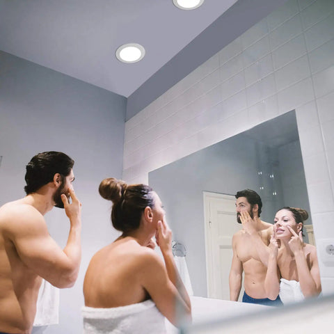 Couple in bathroom with 12 Pack 4 Inch Ultra Thin LED Recessed Ceiling Light Kit With Junction Box, Easy Install, 3000K 4000K 5000K Selectable