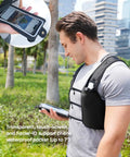 Man wearing Unisex Hands Free Running Hydration Vest With 500ml Soft Flask using phone in black camo in outdoor setting