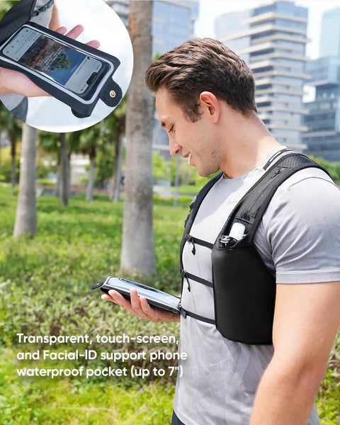 Man wearing Unisex Hands Free Running Hydration Vest With 500ml Soft Flask using phone in black camo in outdoor setting