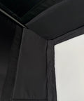 Interior view of Complete Golf Practice Backdrop Enclosure Gear with impact screen and netting setup for a 10x8 ft indoor golf area.