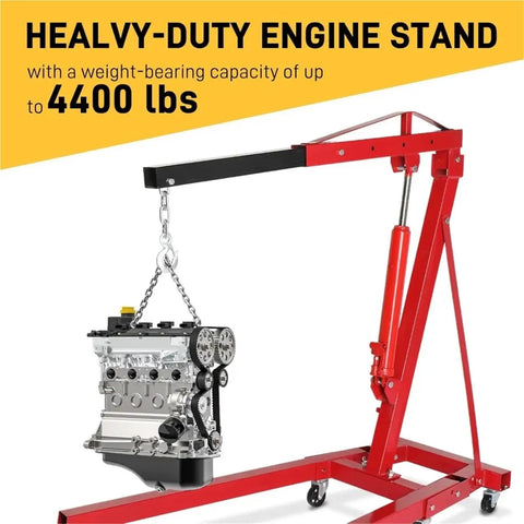 Folding Hydraulic Engine Hoist 2 Ton 4000 Lbs Heavy Duty Rock Solid Auto Garage Crane lifting an engine with chain and support.