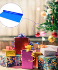 Blue Cellophane Flower Wrapping Paper Pack for Florists and DIY Peeps used for colorful gift wrapping under a Christmas tree.