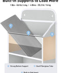 Close-up of Over The Door Organizer With Four Bins And Six Mesh Pockets Swing Proof Hanging Storage for nursery showing bin support.