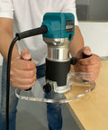Game Changing Clear Acrylic Router Base Plate Compatible With RT0701C And XTR01Z 6 By 10 Inch Wide Base with dual grip handle in use.
