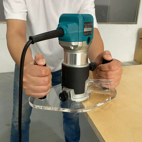 Game Changing Clear Acrylic Router Base Plate Compatible With RT0701C And XTR01Z 6 By 10 Inch Wide Base with dual grip handle in use.
