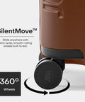 Amazon July Carry On Max expandable brown rolling luggage wheel close-up with 360° SilentMove wheels