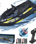High Speed Turbo RC Jet Boat With Dual Batteries, 2.4GHz Remote, LED Lights And Low Battery Alarm pictured with accessories.