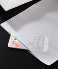 100 Pack White Epe Pearl Foam Pouch Bags For Moving And Shipping Shockproof Cushioning Wrap covering smartphone on black surface