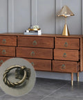 Six Piece Bronze Flower Drop Ring Drawer Pulls Set For Cabinets Dressers And Cupboards With Included Mounting Screws shown installed on wooden dresser