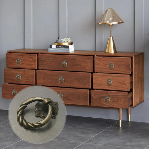 Six Piece Bronze Flower Drop Ring Drawer Pulls Set For Cabinets Dressers And Cupboards With Included Mounting Screws shown installed on wooden dresser