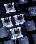 Brown Switch Upgrade Pack For Mechanical Keyboards: 3 Pin Tactile RGB Dustproof Switches, Swap Friendly, Compatible With Cherry MX And Gateron Browns, Fits Redragon And Other MX Style Boards, Pack Of 72 close-up in black keyboard