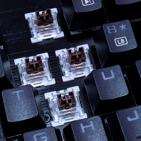 Brown Switch Upgrade Pack For Mechanical Keyboards: 3 Pin Tactile RGB Dustproof Switches, Swap Friendly, Compatible With Cherry MX And Gateron Browns, Fits Redragon And Other MX Style Boards, Pack Of 72 close-up in black keyboard