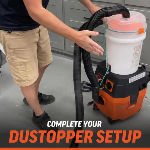 Person installing X Static Grounding Kit For Cyclone Dust Collectors And Shop Vacuums Anti Static Ground Wire on vacuum system