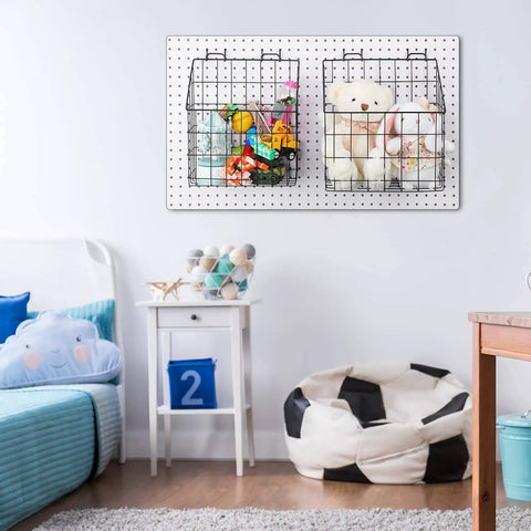 Two Pegboard Baskets Set With Hooks Large 12.4x7.5x12.8 Inches And Medium 11x5x12.6 Inches Includes Four 2 Inch Hooks For Garage Or Workshop Organization Black mounted on wall with toys.