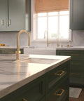 hansgrohe Talis N Pull Down Kitchen Faucet, Modern, Magnetic Hand Sprayer, 1-Handle, 1.75 GPM, Brushed Bronze, 72865141 on marble countertop.