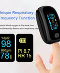 Black rechargeable finger pulse oximeter with SpO2 and pulse rate, respiratory monitoring, touchscreen control; not for medical use.