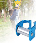 Child using outdoor zipline with Slackline Pulley For Outdoor Zipline Obstacle Course Portable Aluminum Slider Pulley.