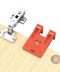 Two In One 35mm Concealed Hinge Jig With Magnetic Positioning Stopper And Gap Adjuster For Cabinets on wood surface