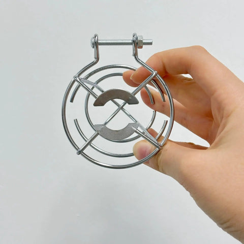 Pair Of Badass Fire Sprinkler Head Guards Made From Rust Resistant Stainless Steel Heavy Duty Cage Covers For One Half And Three Quarter Inch Systems being held.
