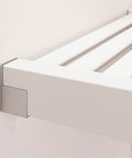 Solid Wood Cut To Fit Closet Storage Kit In Clean White Featuring Reinforced Garment Bars And Deep Spaced Shelving - Close-up of slatted shelf end.