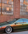 Car finished with Killer Colorshift Pearl Auto Paint Basecoat Midcoat, 128 Oz Gallon, showcasing color shift from teal to bronze.