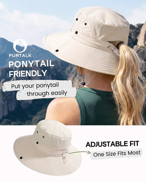 Woman wearing Go To Sun Hat For Women With Ponytail Hole, Wide Brim Beach Bucket Style, Lightweight Nylon, Upf 50 Plus Sun Protection, Outdoor Beige with a view of mountains.