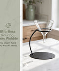 Heavy Duty Coffee Filter Holder Funnel Stand With Slick Black Iron Base For Hands Free Drip Pour Over Brewing, featuring a clear funnel and stable base.