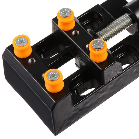 Close-up of vise component from Hand Drill Kit For Jewelry Making And Woodworking Rotary Drill With Twist Bits Vise And PCB Drill Bits.