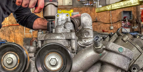 Mechanic using 39 Piece 1/2 Inch Drive 6 Point Impact Socket Set Standard And Deep Metric With Off Corner Loading to prevent rounding