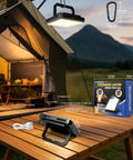 Rechargeable 20000mAh LED Camping Lantern With 1300 Lumen Brightness on wooden table near lit tent, showing USB ports and packaging box.