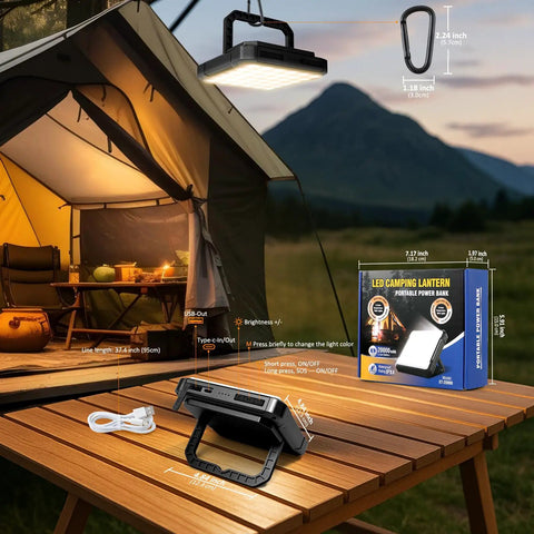 Rechargeable 20000mAh LED Camping Lantern With 1300 Lumen Brightness on wooden table near lit tent, showing USB ports and packaging box.
