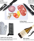 All In One 31 Piece Camping Utensils Set with knives, cutting board, gloves, and wine opener for outdoor cooking.
