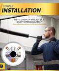 Installer using torsion spring swap for garage door 218x2x24 with 1 inch bearing and winding bars right hand wound for left cone