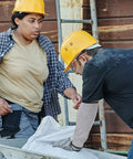 Heavy Duty Cut Resistant Arm Sleeves With Scratch Proof Armor For Gardening And Butchery Tasks Bite Resistant Guards on a worker's arm.