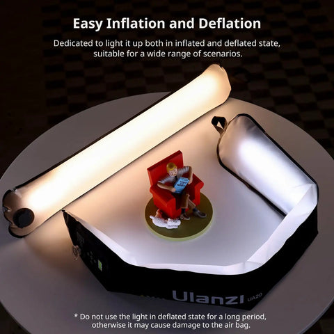 Bi Color 20W Inflatable LED Tube Light for on-the-go filming shown inflated, with magnetic mount displayed on round table.