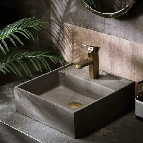 UMJIGF Vessel Sink Small Apartment Above Counter Basin Concrete Wash Basin Single Basin with stylish faucet and greenery.