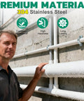 Man standing next to mounted pipes using 90 Piece Must-Have Conduit Clamp Assortment Kit In 304 Stainless Steel, outdoor setting.