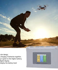 Mini 2Pro Three Channel USB Battery Charger Hub with digital display shown in outdoor drone setup.
