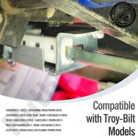 Close-up of CR12 Lawn Tractor Steering Rack Kit installed on Troy-Bilt model, showing metal components and gear mechanism.