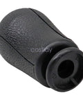 Close-up of Ford Mustang 2011 2012 black 6-speed gear shift knob replacement part BR3Z-7213-A, textured finish visible