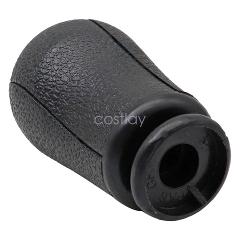 Close-up of Ford Mustang 2011 2012 black 6-speed gear shift knob replacement part BR3Z-7213-A, textured finish visible