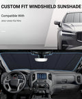 Premium Windshield Sun Shade For Kia Niro And Niro EV 2023 To 2026 Gen 2 installed in a car dashboard, blocking sunlight.