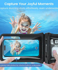 Child swimming underwater with IPX8 Waterproof Phone Pouch Dual Pack 8.3 Inch Case capturing photo with smartphone inside water.