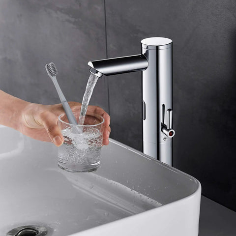 Touchless Bathroom Sink Faucet With Infrared Sensor And Temperature Control Hands Free Tall Body For Commercial Brass Use Adjustable Cold And Hot Water One Hole Single Handle Basin Vessel Auto Water Mixer Chrome Finish in use with glass and toothbrush.
