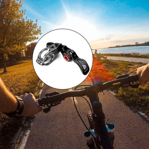 Cyclist view with inset of Seatpost Remote Lever For Mountain Bikes, Aluminum Alloy Cable Controller, Black Finish.